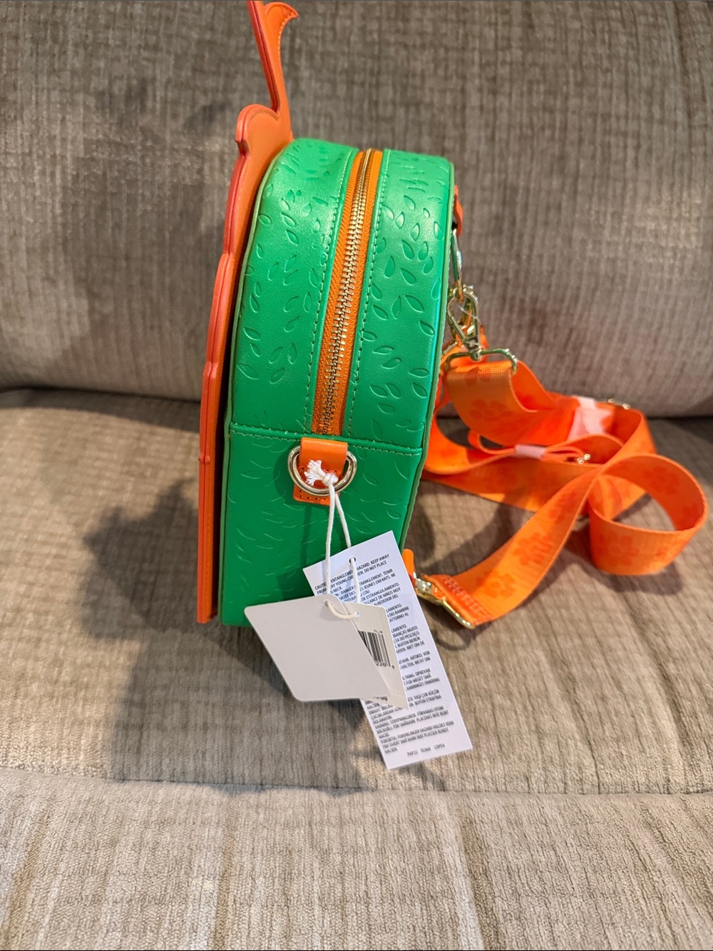 Disney’s EPCOT Flower & Garden Orange Bird Crossbody Bag 2026 - Picture 2 of 13
